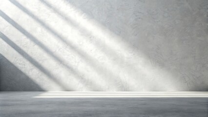 Sunlight streaks across a textured concrete wall and floor creating dramatic shadows