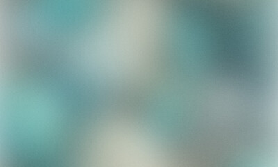 Abstract blurred background with delicate teal and white hues and subtle grain