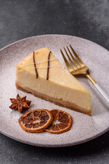 A piece of sweet New York cheesecake, dessert, cheese and vanilla pie. Classic cheesecake