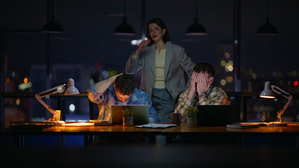 Night managers reacting business fail office laptop closeup. Nervous colleagues