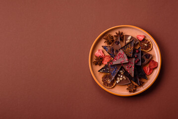 Craft home made chocolate with berries and fruits, delicious sweets. Craft chocolate