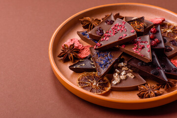 Craft home made chocolate with berries and fruits, delicious sweets. Craft chocolate