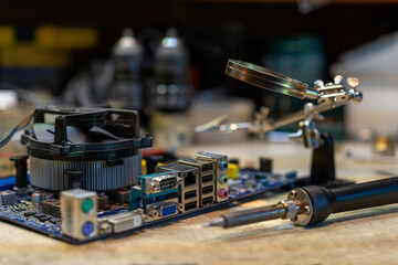 A tool for soldering electronic components. Desoldering of computer boards.