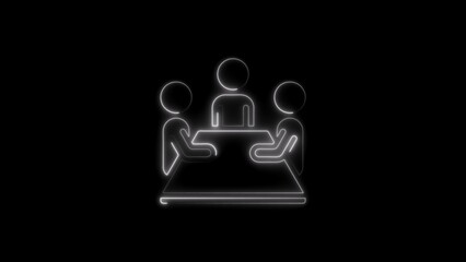 Illuminated business meeting icon depicting collaboration and teamwork against a black background