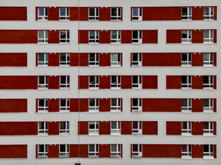 Building windows, white and red walls, new facade