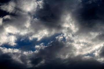 Obraz premium A dramatic cloudscape with glimpses of ligh in sky