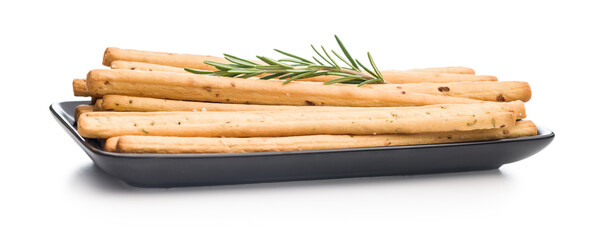 Crispy grissini breadsticks isolated on white background.