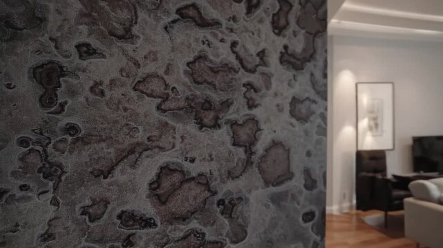 Structural deterioration resulting from excessive humidity on interior partition of contemporary residence