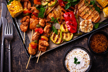 Assortment of grilled bbq meat and vegetables