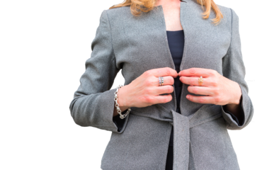 Confident businesswoman adjusting her elegant gray coat in transparent background png. Leadership, empowerment, modern professional style, corporate, business, work, confidence, office, manager