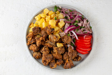 Liver pan (Albanian liver) Turkish traditional food. Liver over rice. (Turkish name; arnavut ciger)