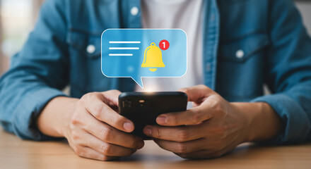 Notification Alert: A man focuses on his phone, with a digital notification overlay, symbolizing the constant flow of digital information and reminders, capturing the modern communication landscape