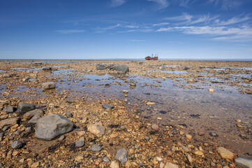 Distant view of the wreck of the MV Ithaca in Hudson Bay near Churchill, Manitoba, Canada