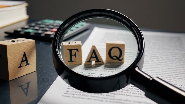 Inquiries acronym depicted with timber cubes, examining lens, and workstation paraphernalia