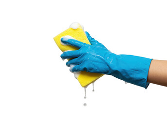 Hand in blue glove squeezing a yellow sponge with foamy soap bubbles against a solid color surface on transparent background