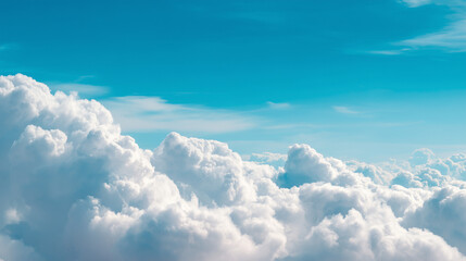 fluffy white clouds covering blue sky natural background