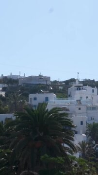Experience Mykonos Greece stunning, with iconic white buildings and domes against the beautiful Aegean Sea, making its perfect destination for lovers of scenic beauty and exploration.