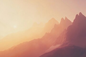 Obraz premium Warm sunlight illuminates a majestic mountain range shrouded in a hazy atmosphere, creating a serene and captivating landscape