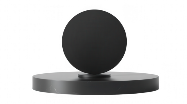 A modern black circular sculpture rests on a round pedestal highlighting simplicity and elegance in an artistic arrangement suited for contemporary decor