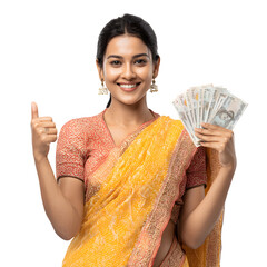 Joyful woman in traditional attire celebrates financial success with a fan of currency.