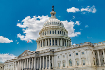 The Capitol building stands tall in Washington, D.C. Clear skies frame this iconic landmark of freedom.