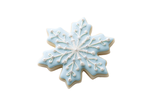 A blue snowflake cookie with white icing
