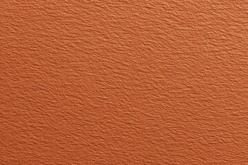 Textured orange surface with uniform pattern and vibrant color