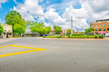 The picturesque Town Square with the Confederate Monument in the center surrounded by shops and...