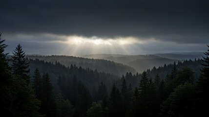Obraz premium A dramatic and moody mountain landscape with sunbeams breaking through dark, stormy clouds. This beautiful and hopeful scene represents light breaking through darkness.