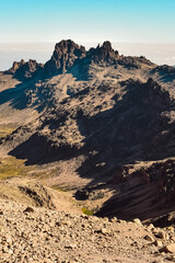 Scenic view of volcanic rock formations at Point Lenana in Mount Kenya National Park in Kenya 