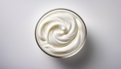creamy greek yogurt in glass bowl on white background with copy space top view yogurt creamy white