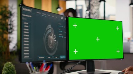 Female technician using CAD tool on isolated screen computer to reduce carbon footprint of wind turbines. Woman in RD office upgrading eco friendly windmill parts on mockup PC, camera B - Powered by Adobe