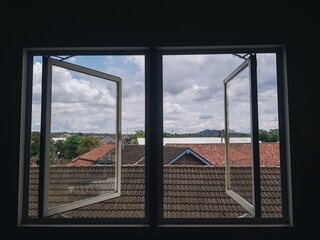 Empty room with interior glass window frame facing out