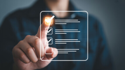 Digital checklist app on virtual screen for task management and business productivity concept