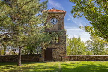Obraz premium Clock tower on the church at the Monastery of Theotokos the Merciful.