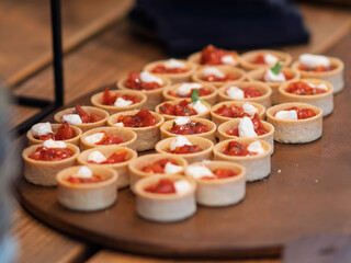 Delicious Mini Tomato Tartlets with Creamy Toppings