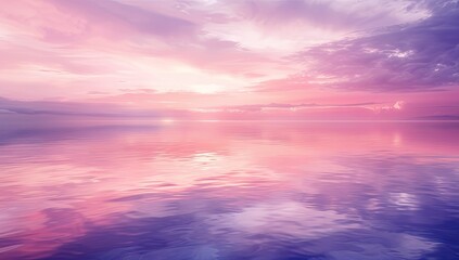 Obraz premium Pink sunrise over calm ocean; serene morning sky reflecting on water; peaceful nature scene; ideal for travel or meditation