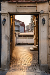 Doorway leading to an alleyway.