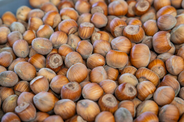 Hazelnuts for sale at an outdoor market.