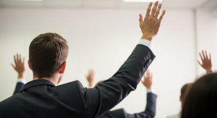 Entrepreneur raising his hand Participating in the meeting
