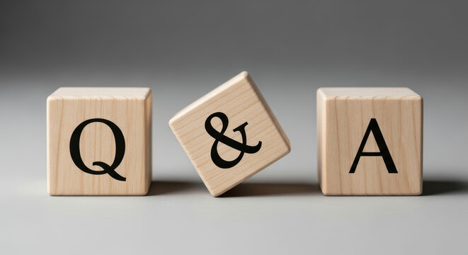 Wooden blocks spelling Q and A for FAQ page website design concept