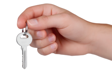 Hand offers shiny silver key, symbolizing opportunity, access, and new beginnings.