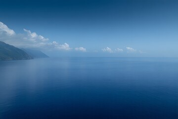 Fototapeta premium Serene Coastal Landscape, Ocean View with Clouds and Cliffs