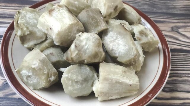 A delicious pile of boiled sweet potato slices on a plate. Ipomoea batatas L. is a tuber that is widely found in Indonesia and is beneficial for digestion.