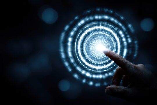 Hand touching glowing circular interface