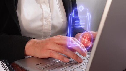 Document control with a risk sign. Visual detail of an executive using her laptop in the office with a floating clipboard icon with a warning sign.