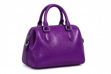 Stylish purple leather handbag with silver hardware, isolated on a transparent background, perfect for showcasing fashion or retail projects