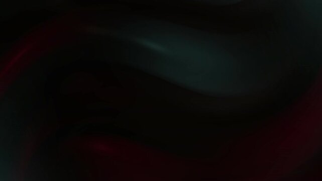 Dark teal and burgundy swirling abstract motion background. Smooth, flowing curves create a sense of depth and movement against a black backdrop. Low-key lighting enhances the moody atmosphere.
