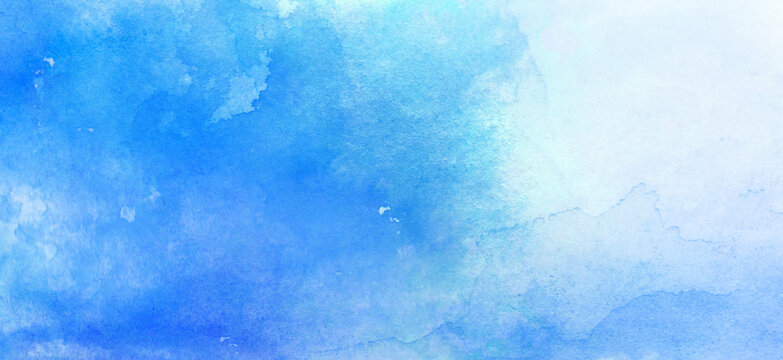 コピースペースのある冬をイメージした青色の水彩背景　背景イラスト　テクスチャ素材