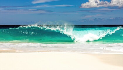 Turquoise ocean wave crashes on a pristine white sand beach under a bright blue sky.
